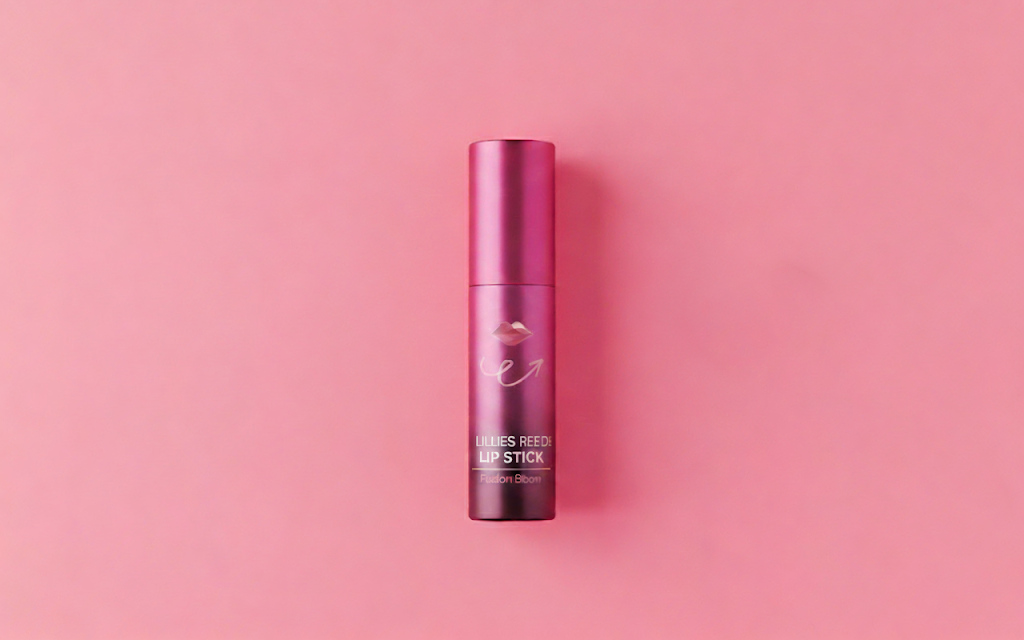 Pink lip stick on a pink background